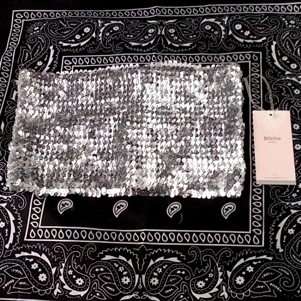 A silver sequined tube top